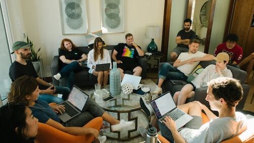 Group of people having a meeting in a large room