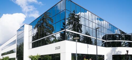 An office building against the blue sky.