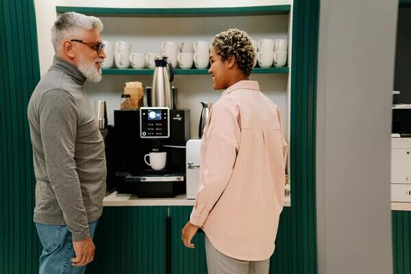 2 people at a water station