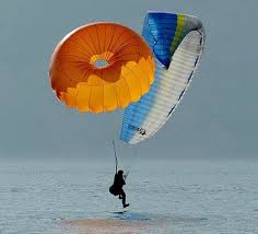 Round reserve parachute for paragliding and ppg