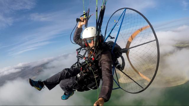 Learn to paramotor around the clouds