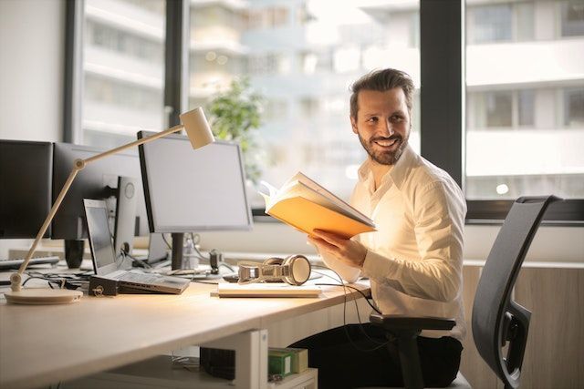 Man who is learning key habits for professional growth.