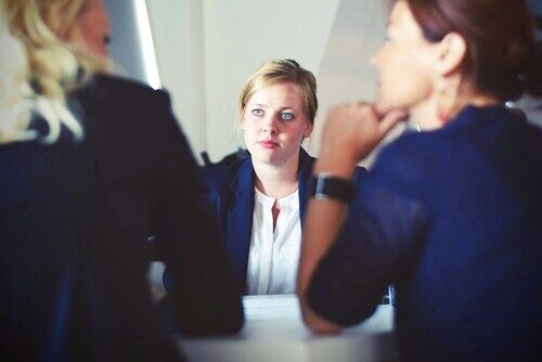 women executive sitting at table