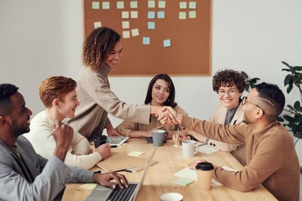 A new employee meeting colleagues.