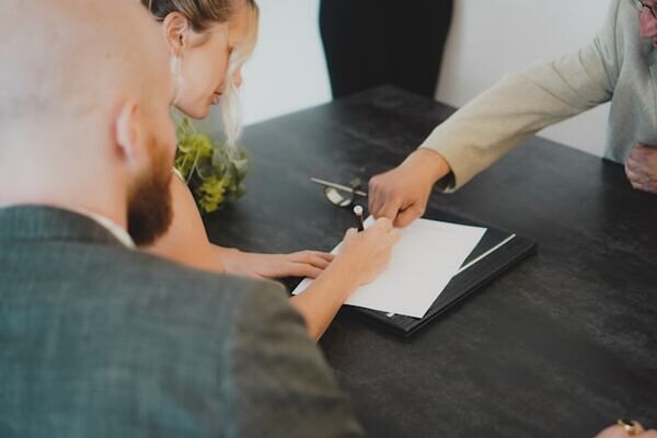 Person signing a contract