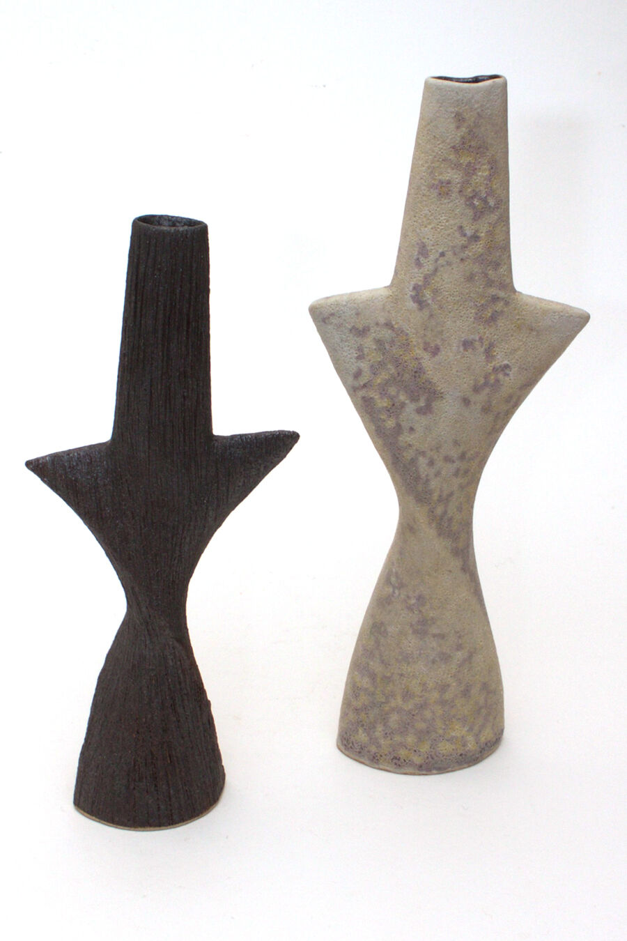 Pair of ceramic twisting totemic forms by Chris Carter