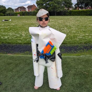 kid wearing space costume 