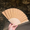 Folding hand fan made from cork