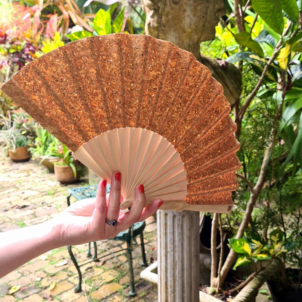 Folding hand fan made from cork